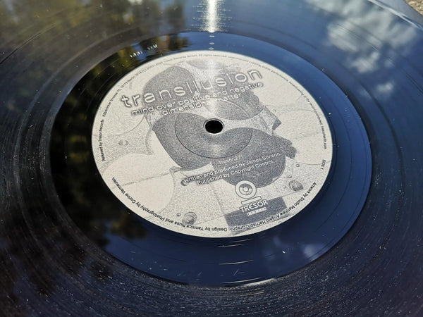 TRANSLLUSION 'MIND OVER POSITIVE AND NEGATIVE DIMENSIONAL MATTER' 12" (REPRESS)